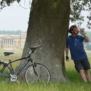 nc450 holkham hall cyclist drinking2